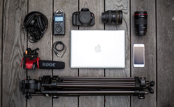 Bird's-eye view of DSLR, mic, and other gear